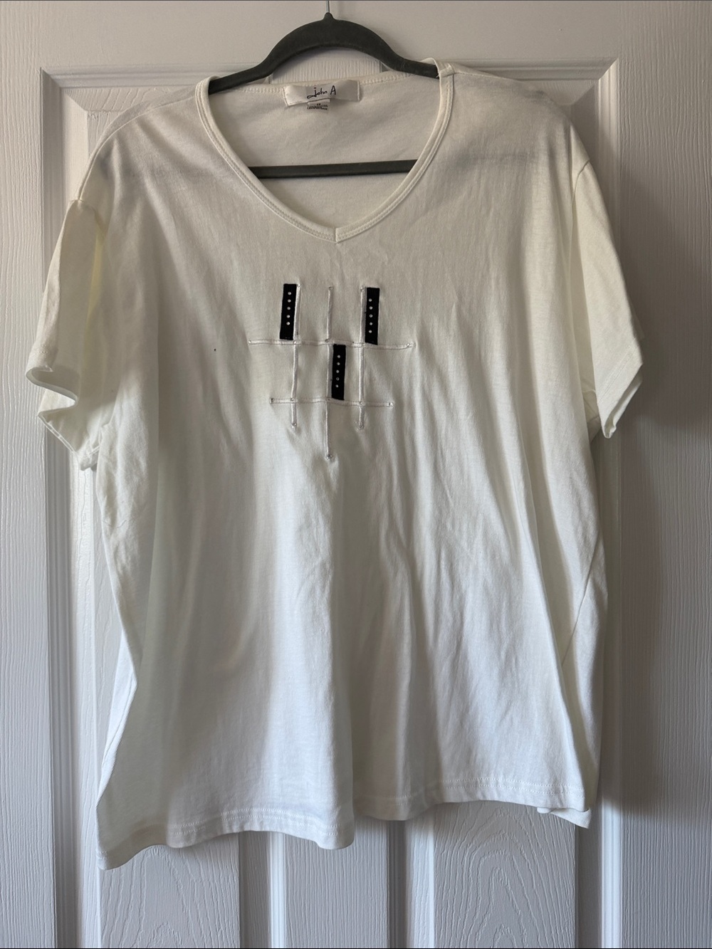 White V-Neck Women's Top with Embroidered Accent